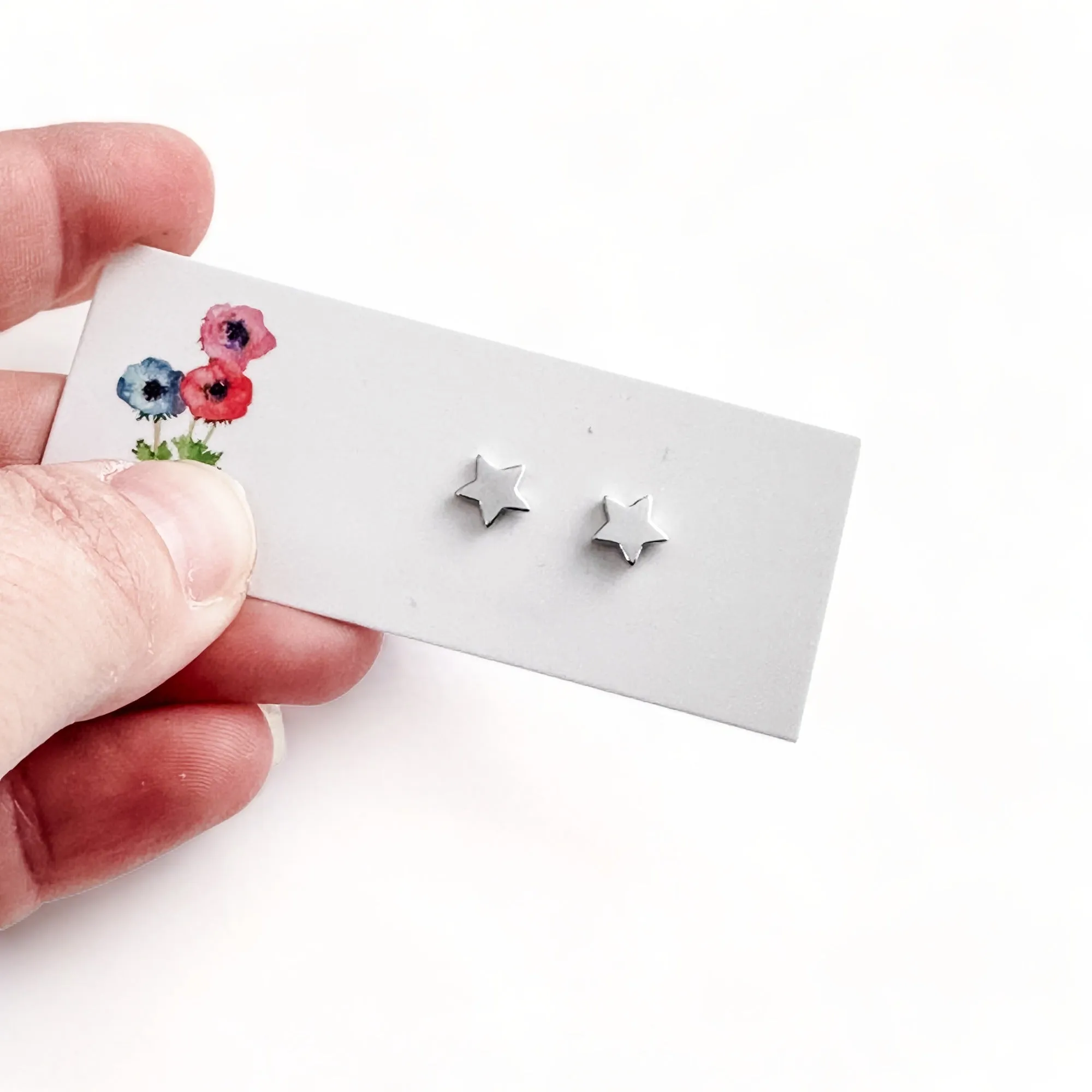 Tiny star stud earring